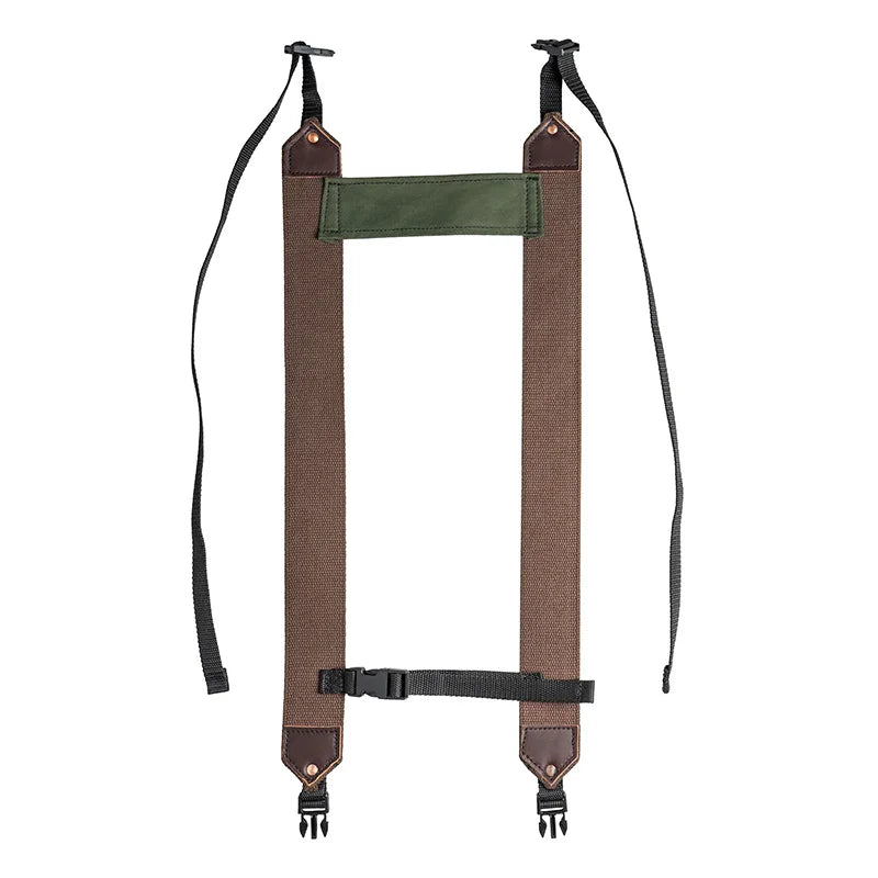 All Day Lumbar Pack removable shoulder straps and waist belt in olive drab and brown canvas with leather reinforcements, designed for rugged outdoor use by Duluth Pack.