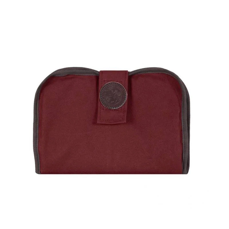 Pistol Cleaning Pad in burgundy black-trimmed rugged canvas with button closure, designed for durable outdoor firearm care by Duluth Pack.