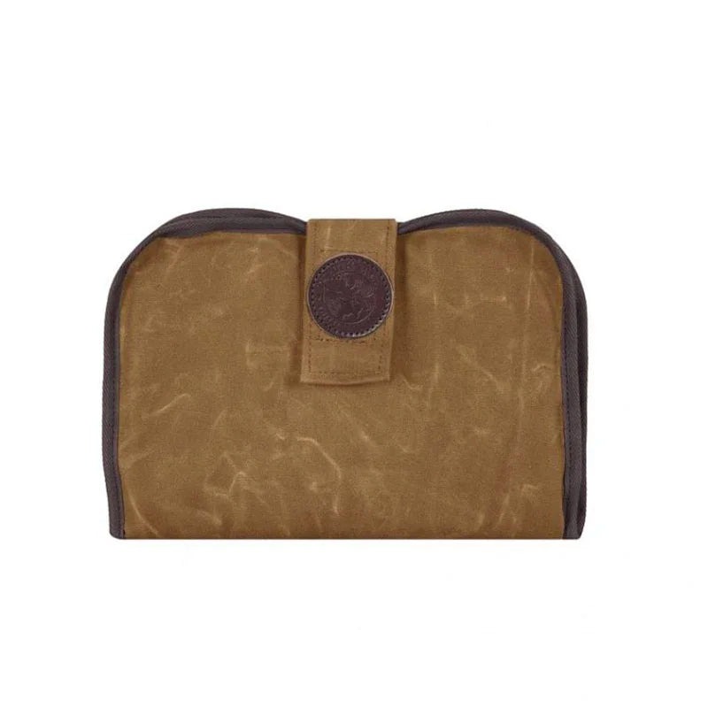 Pistol Cleaning Pad in waxed khaki canvas with leather trim, featuring durable handmade construction for outdoor firearm care by Duluth Pack.