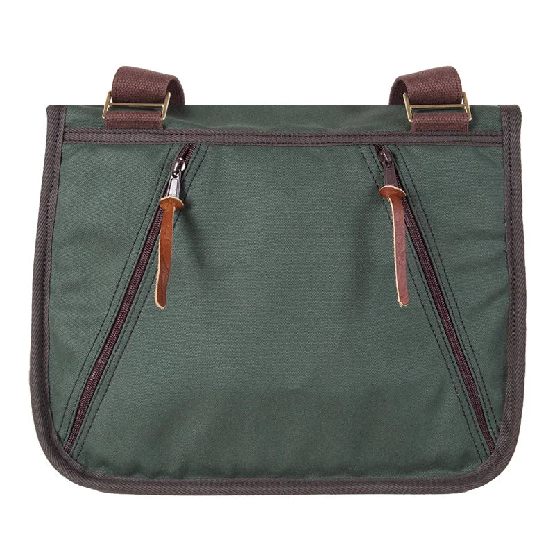 Conceal &amp; Carry Field Satchel in rugged green canvas with leather zipper pulls, designed for durable outdoor use by Duluth Pack.