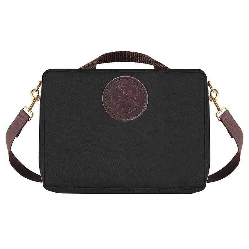 Mini Tackle Box in black canvas with removable cotton web shoulder strap and antique brass hardware, designed for durable outdoor use by Duluth Pack.