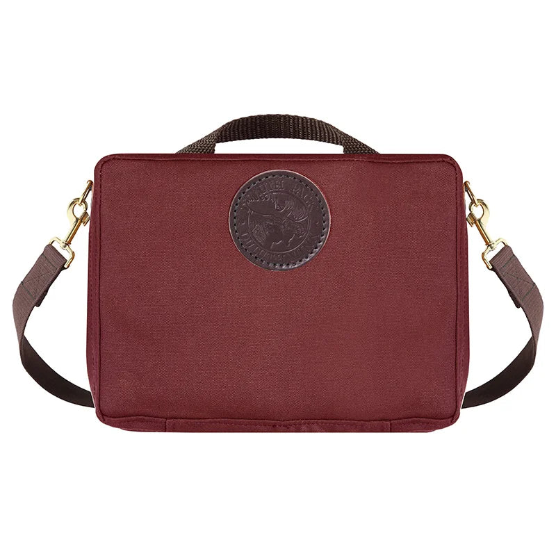 Mini Tackle Box in burgundy canvas with cotton web shoulder strap and brass hardware, designed for rugged outdoor use by Duluth Pack.