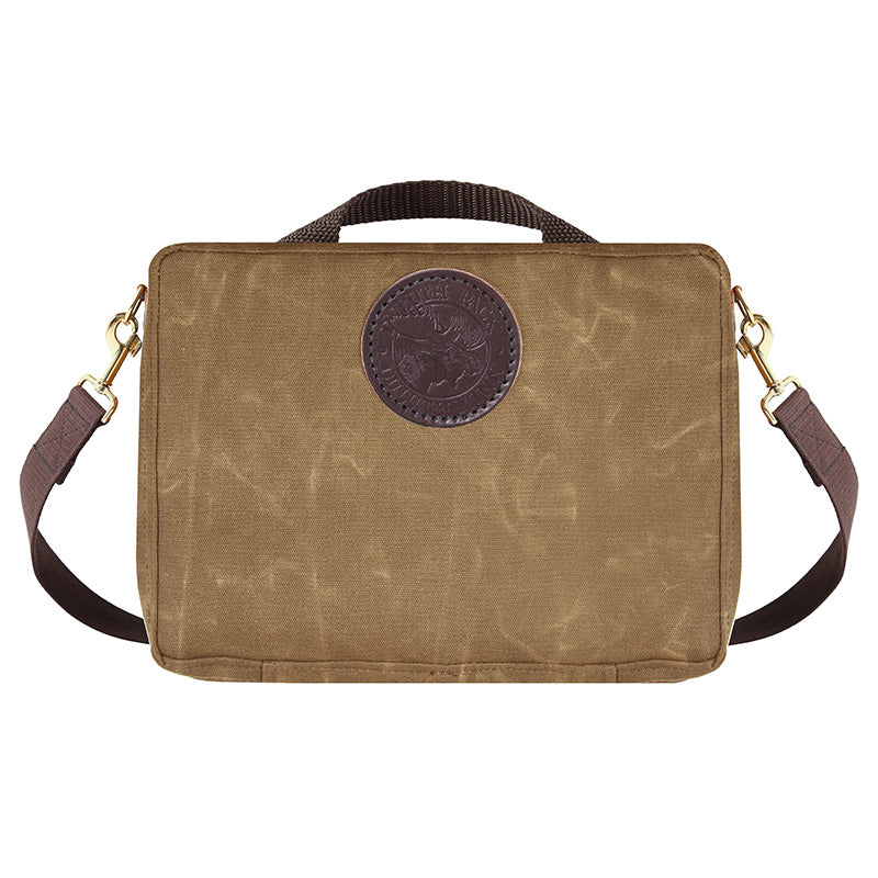 Mini Tackle Box in waxed khaki canvas with cotton web shoulder strap and antique brass hardware, designed for durable outdoor use by Duluth Pack.