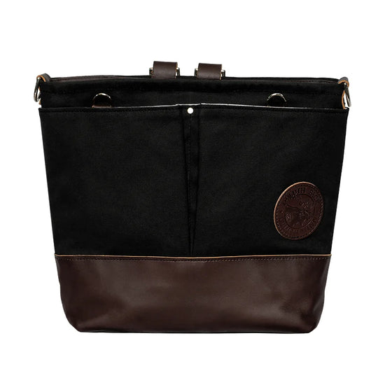 Convertible Jet-Setter Tote in black canvas and brown leather, featuring durable craftsmanship by Duluth Pack for versatile outdoor and travel use.