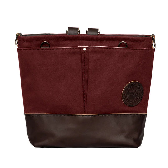 Convertible Jet-Setter Tote in burgundy with dark leather bottom, showcasing durable craftsmanship and versatile outdoor design by Duluth Pack.