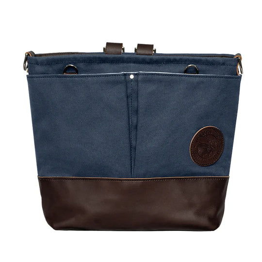 Convertible Jet-Setter Tote in navy with brown leather bottom, showcasing durable handmade canvas and leather craftsmanship by Duluth Pack for versatile everyday use.