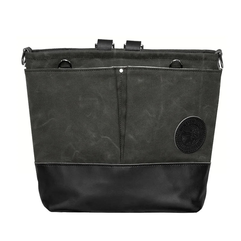 Convertible Jet-Setter Tote in waxed grey canvas and black leather, featuring durable craftsmanship by Duluth Pack for versatile outdoor use and travel adventures.