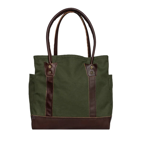 Highlander Tote in Olive Drab with leather accents, a durable handmade canvas and leather bag designed for outdoor use and everyday rugged carry.