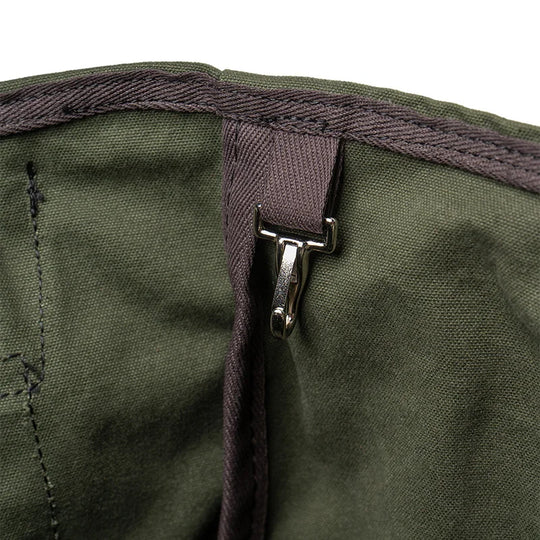 Highlander Tote interior clip detail in olive drab canvas, showcasing durable craftsmanship for secure key attachment by Duluth Pack.