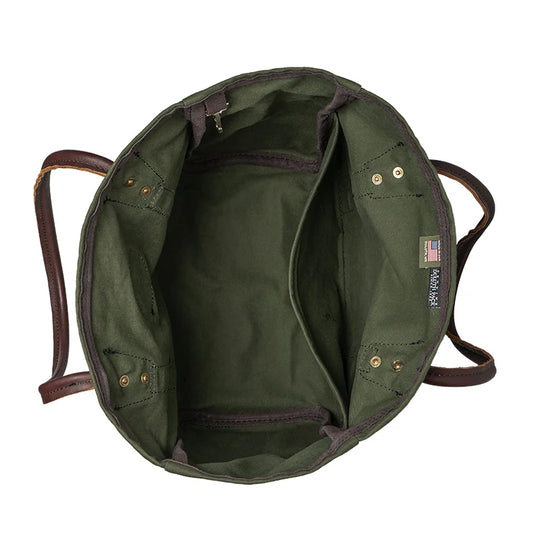 Highlander Tote in Olive Drab with durable canvas interior featuring a full-length half-height slip pocket and key clip, crafted by Duluth Pack for rugged outdoor use.