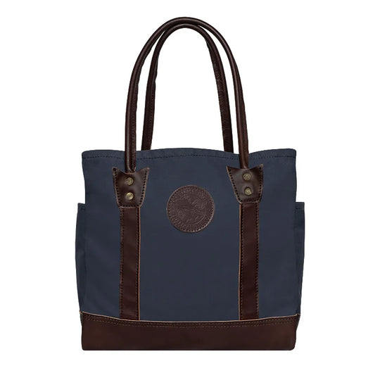 Highlander Tote in Navy with brown leather accents, handmade canvas bag designed for durable everyday use by Duluth Pack outdoors enthusiasts.