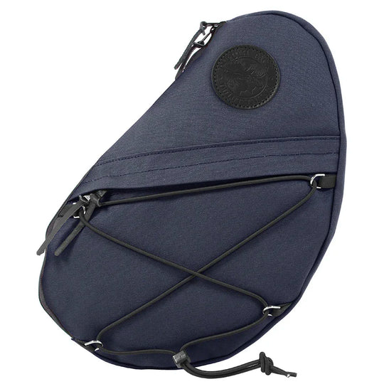 Sling Pack in Navy featuring hand-constructed durable canvas, external pocket, and adjustable cord for versatile outdoor use and rugged performance.