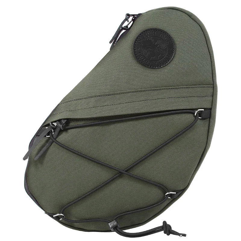 Sling Pack in Olive Drab featuring durable handmade canvas, external pocket, and adjustable bungee cords, designed for rugged outdoor use by Duluth Pack.