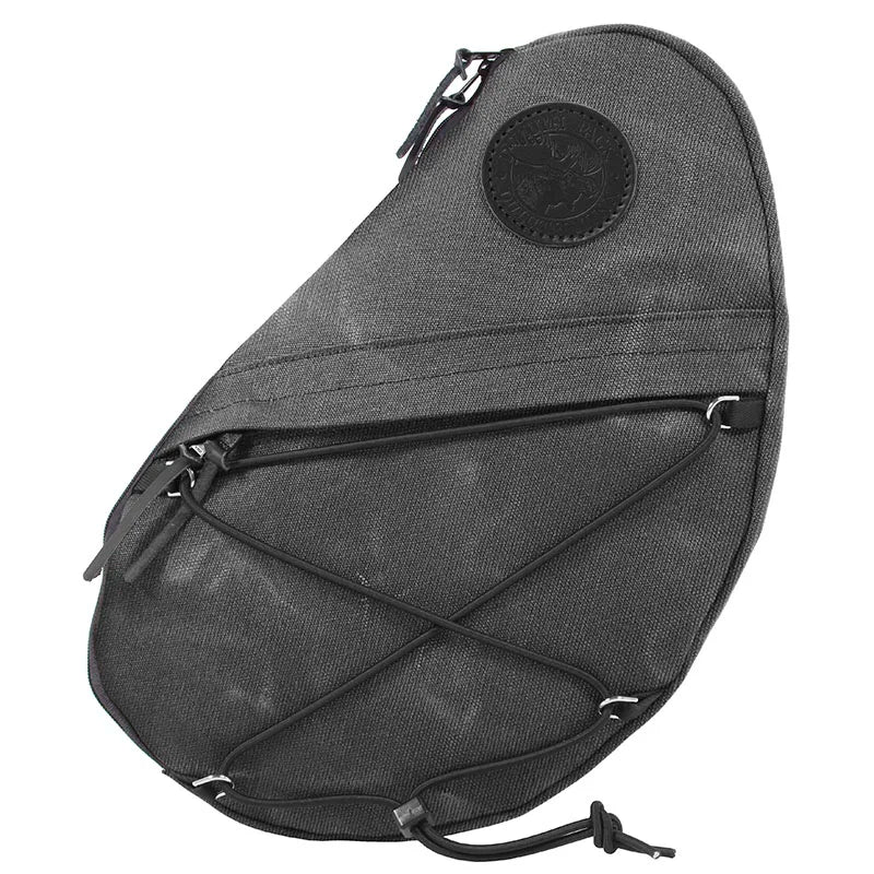 Sling Pack in waxed grey canvas with outside pocket and durable construction, designed for versatile outdoor use and rugged performance.