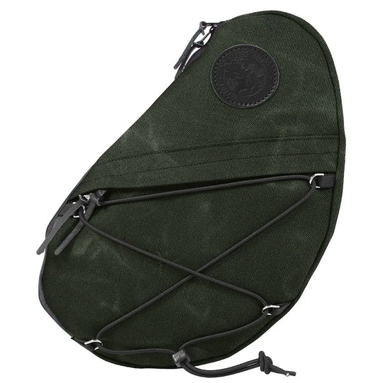 Sling Pack in Olive Drab with durable waxed canvas construction, featuring adjustable bungee cords and a zippered external pocket, designed for rugged outdoor use.