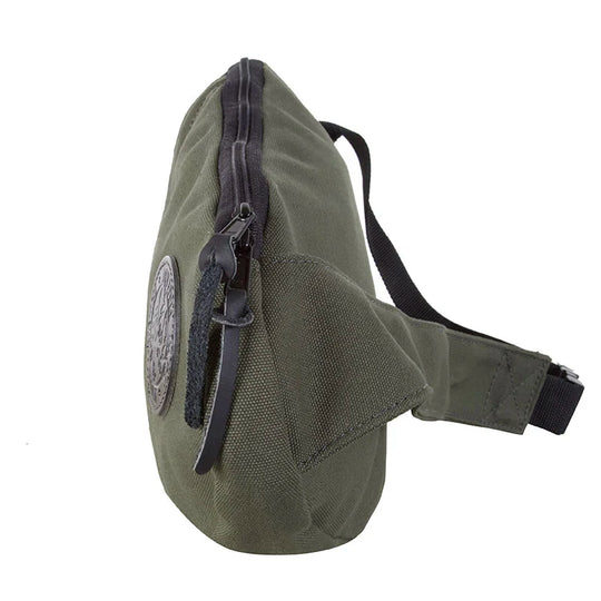 Sling Pack in Olive Drab featuring hand-constructed canvas and leather zipper pull, designed for durable outdoor use by Duluth Pack.