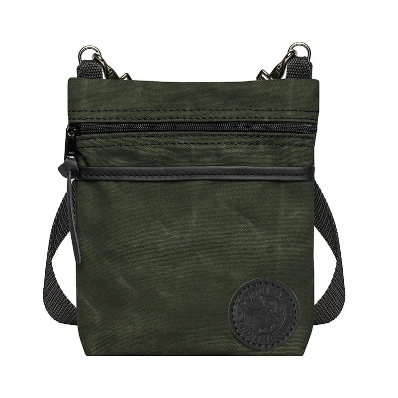 Signature Crossbody Purse in Olive Drab rugged canvas with adjustable cotton strap, designed for durable outdoor use and lasting craftsmanship.