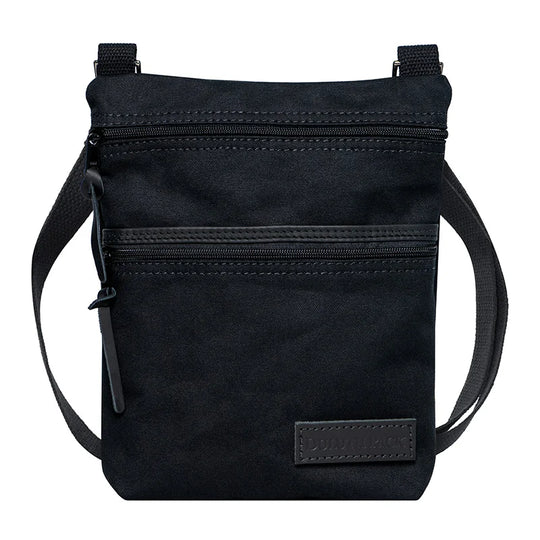 Superior Series Canvas Traverse Crossbody in black canvas with dual zippered compartments and adjustable cotton web shoulder strap, designed for everyday use and travel.