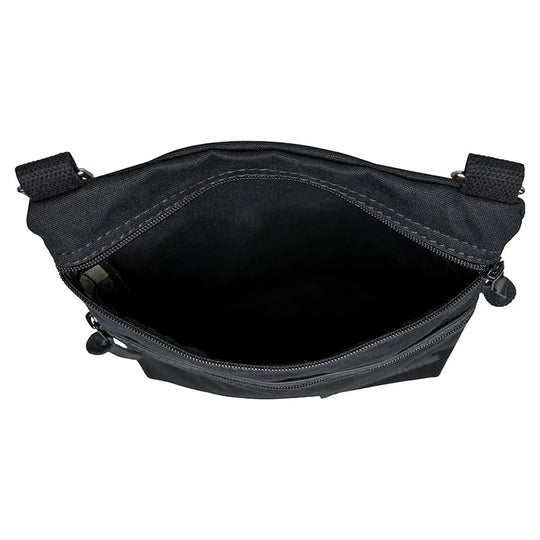 Superior Series Canvas Traverse Crossbody in black canvas with cotton web shoulder strap, open top showing spacious interior for everyday and travel use