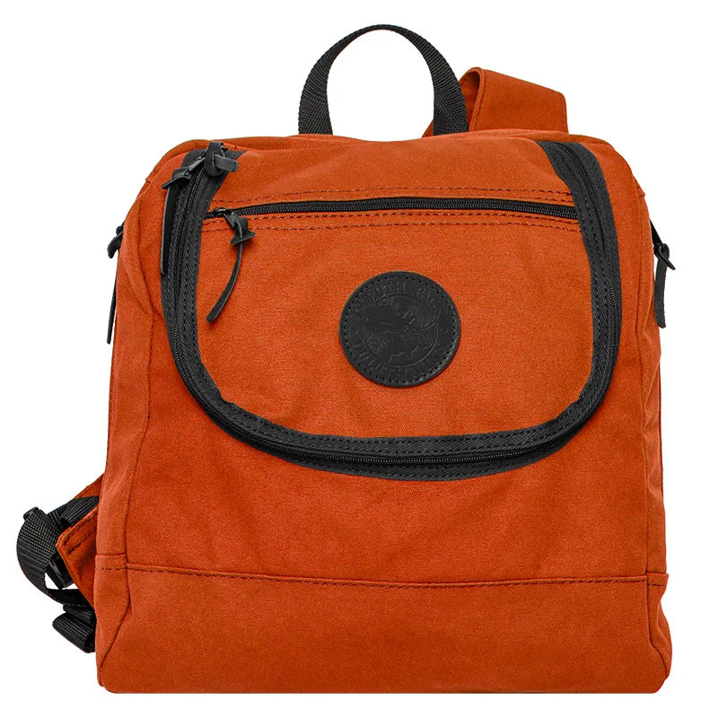 Blind Bag in orange rugged canvas with black zipper pockets, designed for durable outdoor use and quick access, ideal for hunting and adventure settings.
