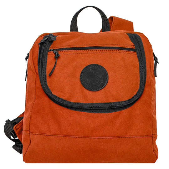 Blind Bag in orange rugged canvas with black zipper pockets, designed for durable outdoor use and quick access, ideal for hunting and adventure settings.