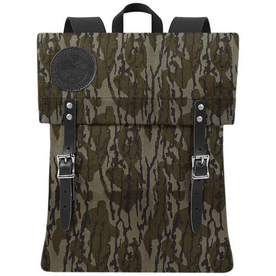Scout Pack in Mossy Oak Bottomland Camo featuring handcrafted canvas and leather straps, designed for rugged outdoor use and lasting durability.
