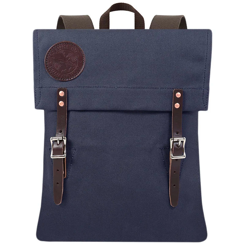 Scout Pack in navy with handcrafted durable canvas and leather straps, reflecting heritage outdoor gear crafted for rugged, long-lasting use.