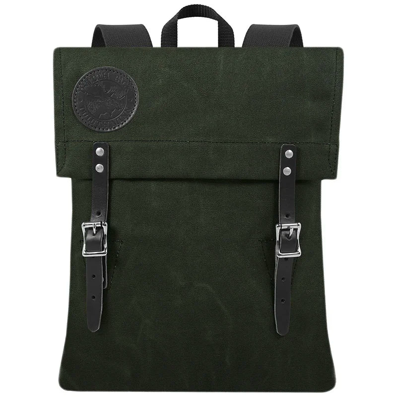 Scout Pack in Olive Drab featuring handmade waxed canvas and leather straps, designed by Duluth Pack for rugged outdoor use and long-lasting durability.