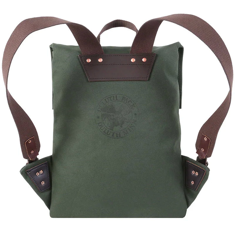 Scout Pack in Olive Drab featuring durable handmade canvas and leather straps, designed for rugged outdoor use with a heritage craftsmanship feel by Duluth Pack.
