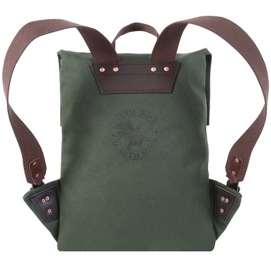 Scout Pack in Olive Drab featuring durable handmade canvas and leather straps, designed for rugged outdoor use with a heritage craftsmanship feel by Duluth Pack.