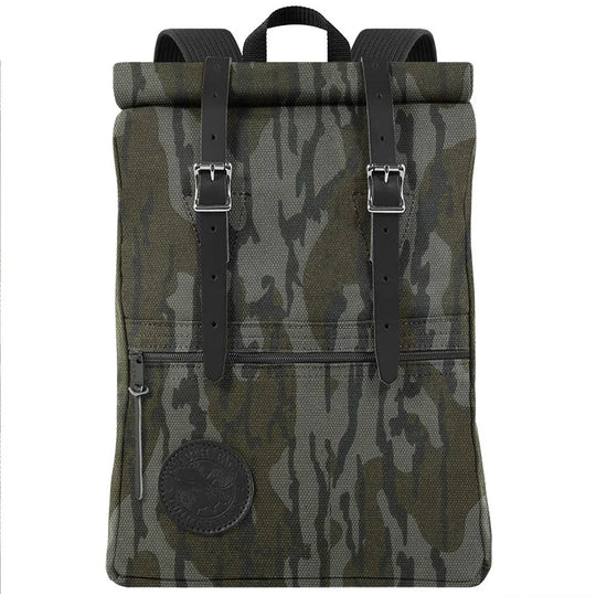 Roll-Top Scout Pack in camouflage canvas with leather straps, featuring a roll-top closure designed for versatile outdoor use and rugged durability.