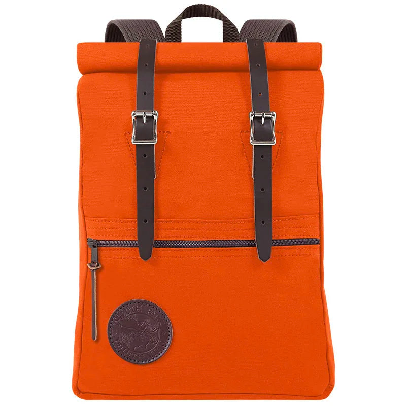 Roll-Top Scout Pack in bright orange canvas with leather straps, showcasing durable craftsmanship designed for rugged outdoor use and versatile carrying options.