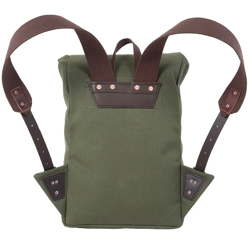 Roll-Top Scout Pack in durable olive green canvas with brown leather accents and adjustable straps, designed for rugged outdoor use by Duluth Pack.