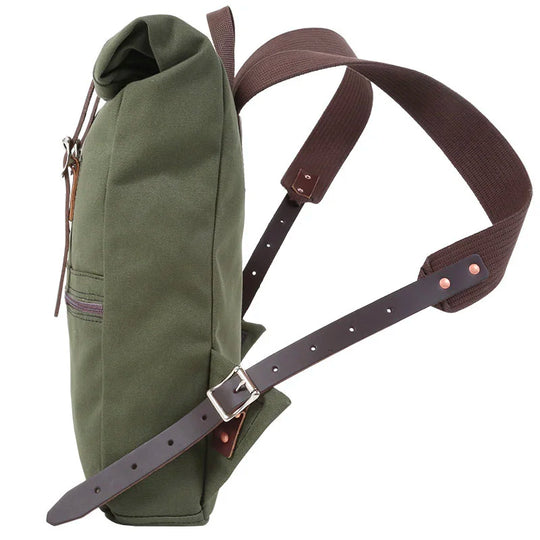 Roll-Top Scout Pack in durable green canvas with brown leather and strap, designed for rugged outdoor use and versatile roll-top closure.