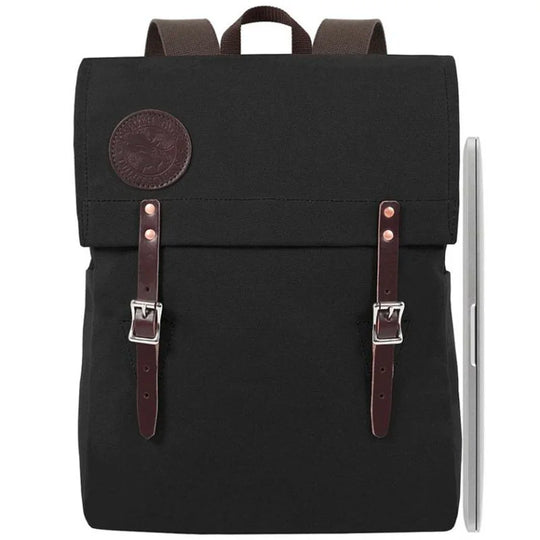 Laptop Scoutmaster in black with leather straps, handcrafted canvas backpack by Duluth Pack, designed for durable outdoor and everyday use.