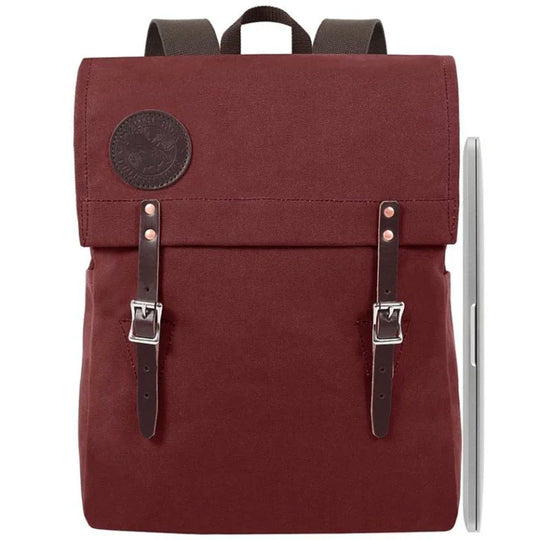 Laptop Scoutmaster in burgundy with leather straps by Duluth Pack, a durable handmade canvas backpack ideal for town and outdoor use.