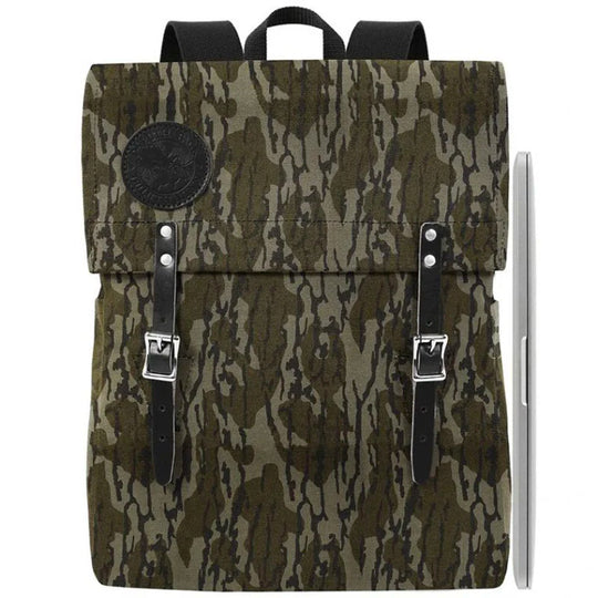 Laptop Scoutmaster in Mossy Oak Bottomland Camo with handmade canvas and leather accents by Duluth Pack, ideal for rugged outdoor use and urban settings.