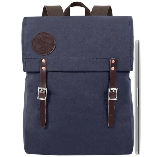 Laptop Scoutmaster in navy with leather straps by Duluth Pack, showcasing handmade canvas durability and rugged everyday outdoor use.