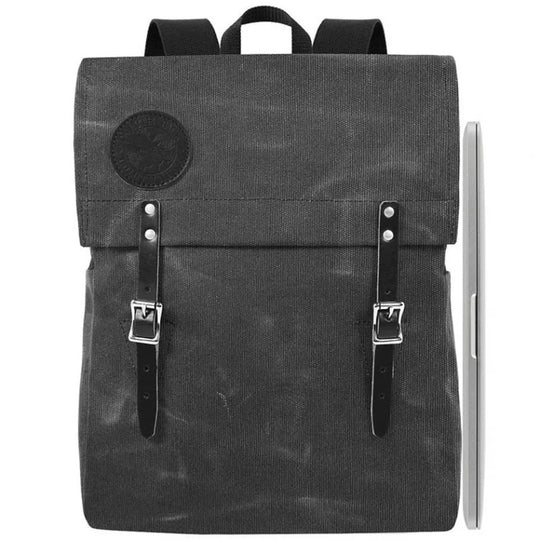 Laptop Scoutmaster in waxed grey canvas with leather straps, crafted by Duluth Pack for durable outdoor and everyday use.