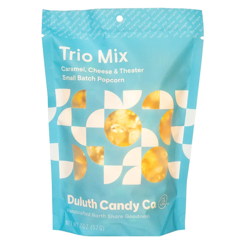 Duluth Candy Co. Popcorn Mix in trio mix with caramel, cheese, and theater with a white background