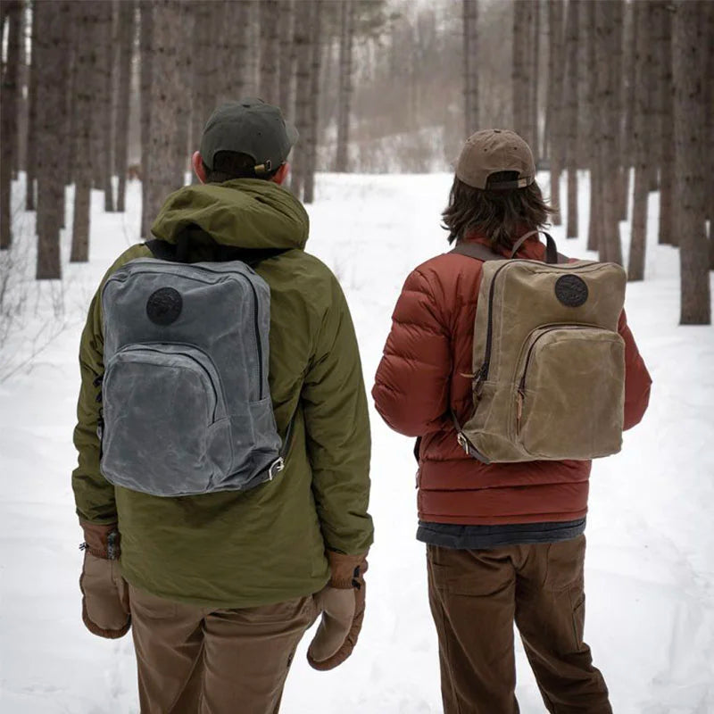 Two Large Standard Backpacks on Models in Winter