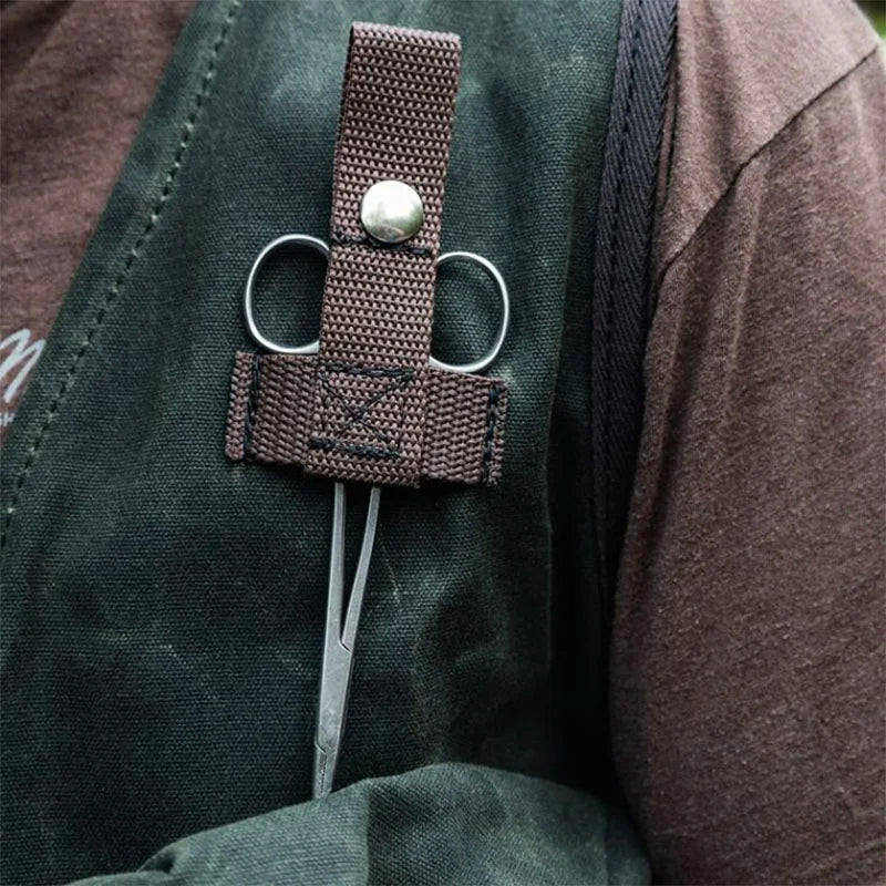 Fly Vest on a model with scissors