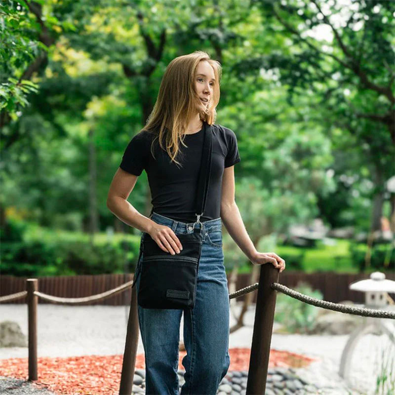 Superior Series Traverse Crossbody on Model in Park