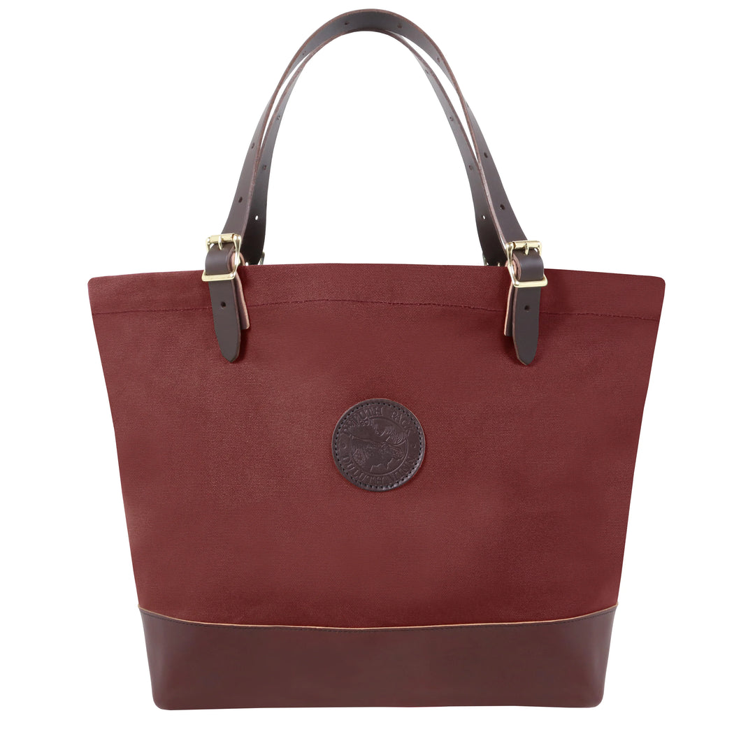 Deluxe Market Tote in burgundy with leather handles and antique brass hardware, handcrafted canvas and leather perfect for rugged outdoor use by Duluth Pack.
