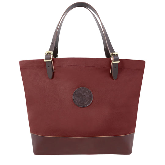 Deluxe Market Tote in burgundy with leather handles and antique brass hardware, handcrafted canvas and leather perfect for rugged outdoor use by Duluth Pack.