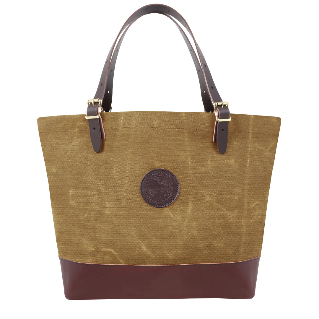 Deluxe Market Tote in waxed khaki canvas and leather with adjustable leather handles, designed for rugged outdoor use and long-lasting durability.