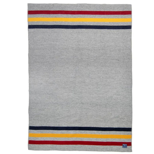 Faribault Frontier Blanket in grey with a white background