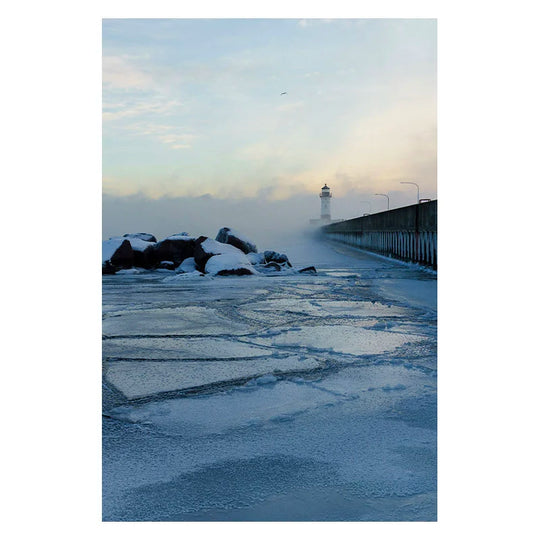 Postcard photo by Gavin Weiers of sea smoke in winter with lighthouse ice and bird