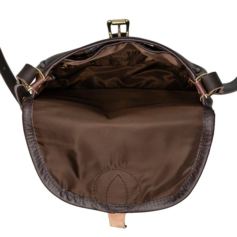 Small Leather Shell Purse featuring premium leather and full nylon lining, showcasing durable craftsmanship by Duluth Pack for rugged outdoor use.