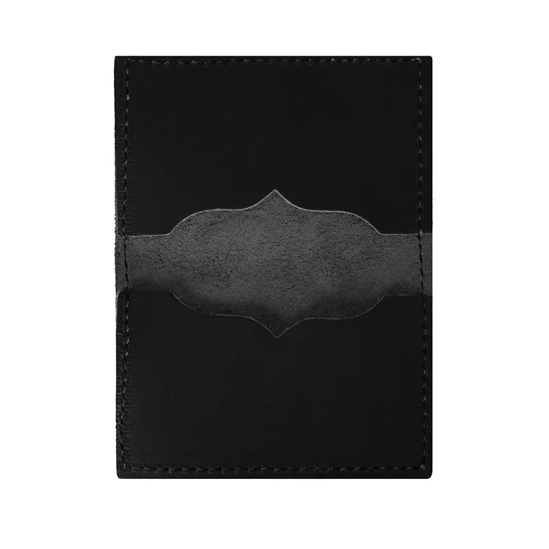 Business Card Holder in premium black leather with embossed Duluth Pack logo, designed for durable and stylish organization of business cards.
